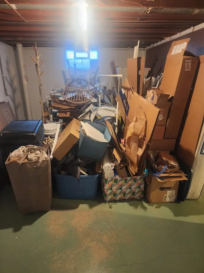 Roll-off dumpster container at job site for 2 Yard Dumpster Rental in Jacksonville